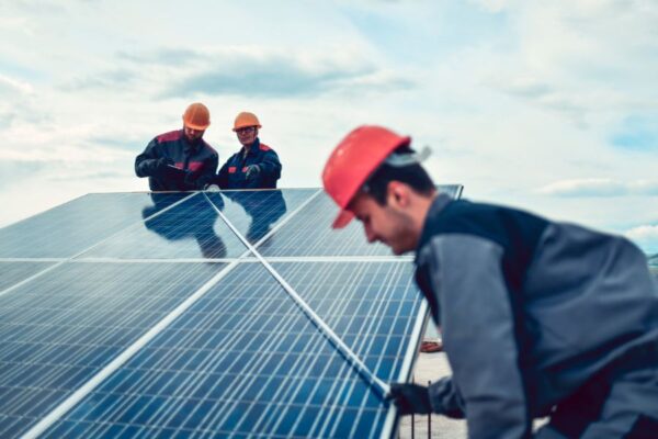 people installing solar
